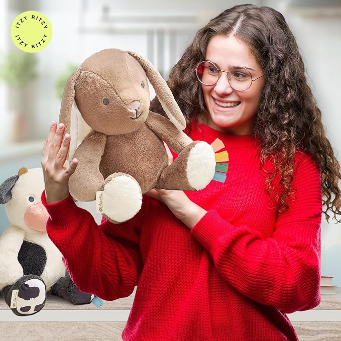 Itzy Ritzy Snuggles Plush Toy – Soft Stuffed Animal for Babies, Kids & Adults – Sensory Ribbons & Textured Fabrics for Tactile Play – Cozy & Cuddly Companion for Newborns & Up (Taupe Bunny)