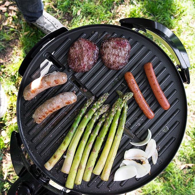George Foreman Indoor/Outdoor Electric Grill with Stand, 15-Serving | 15-serving electric grill with removable stand, 5 heat settings and fat-removing slope for healthier grilling.